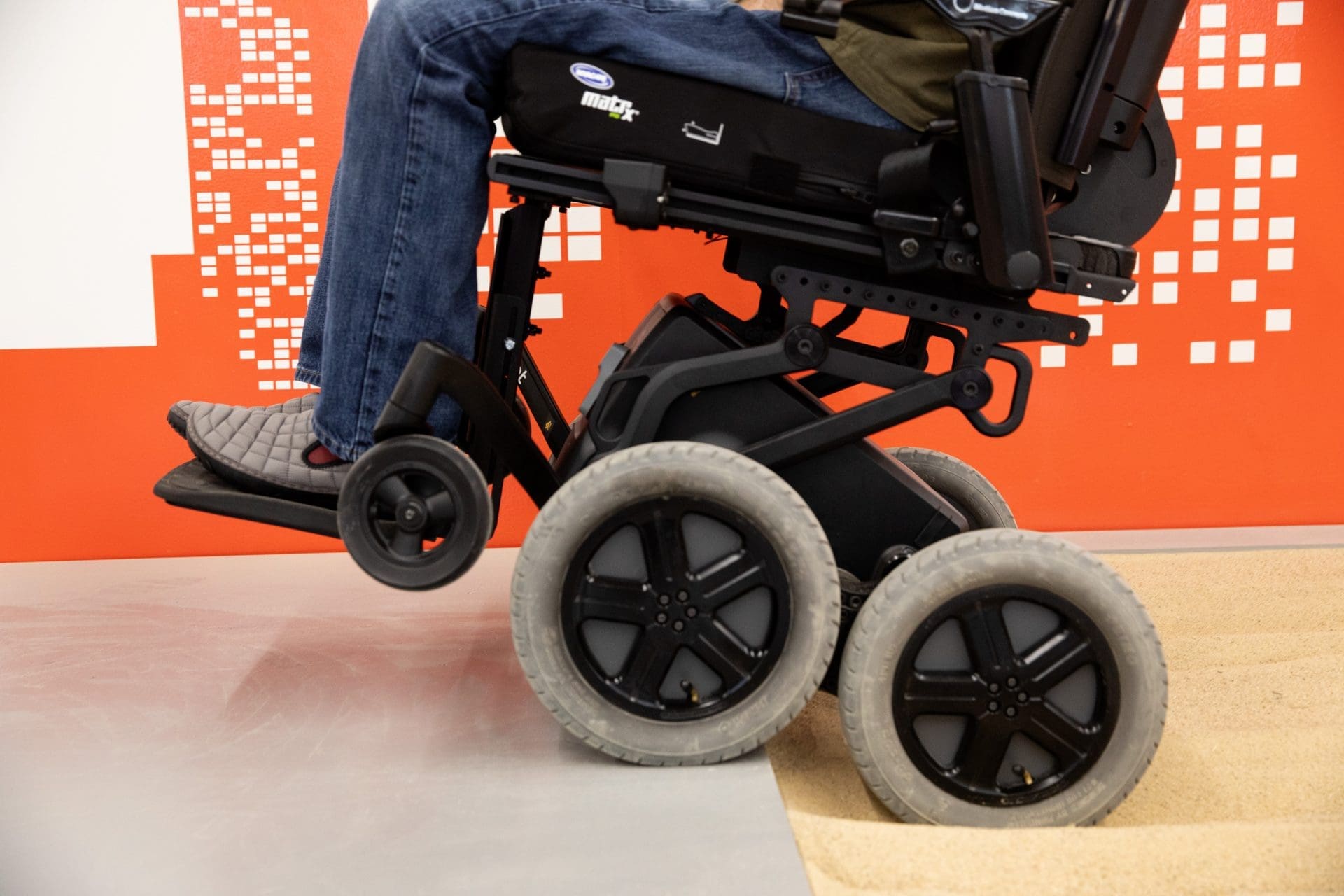 iBOT user going from sand to curb